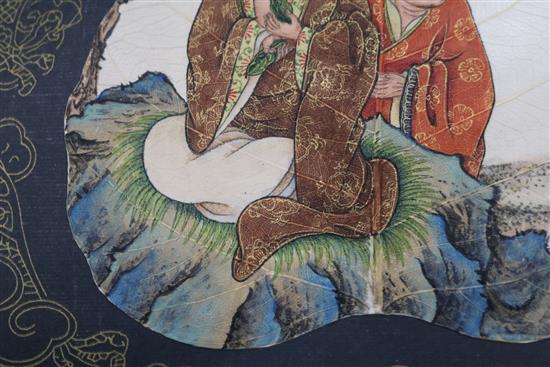 A Chinese painting of two luohan, on a leaf